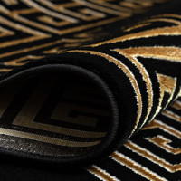 Kusový koberec Allure 1968 black/gold