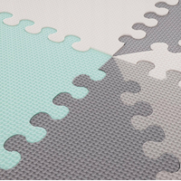 Matadi Pěnové puzzle šedo-zelené Trojúhelníky s okraji