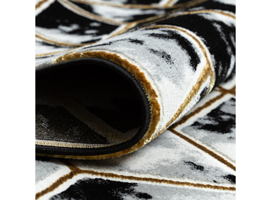Kusový koberec Allure 1966 black/gold