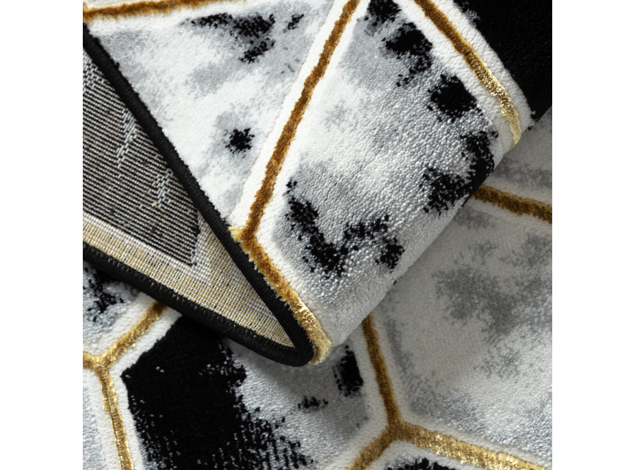 Kusový koberec Allure 1966 black/gold