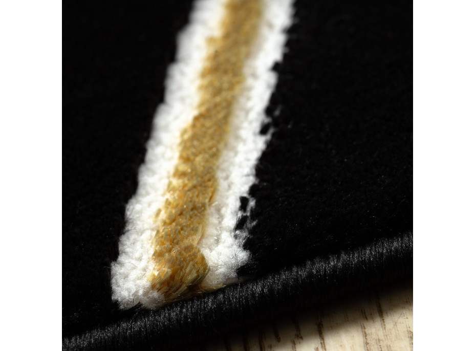Kusový koberec Allure 1964 black/gold